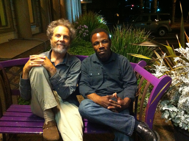 Peter and Leonard sitting on the purple bench at Ki's. 